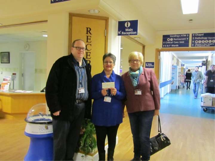 Bill Warren and Jeanette Warren present a cheque from Radio Horton to the Horton General Hospital's Fundraising Projects Manager, Yolanda Jacob.